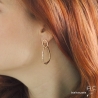 Boucles d'oreilles avec deux anneaux entrelacé en plaqué or martelé, pendantes, femme
