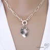 rand pendentif en forme de coeur orné de motifs floraux en argent massif, inspiré de l'art mexicain