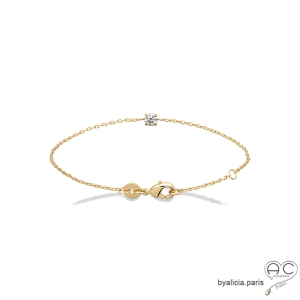 Bracelet avec solitaire en zirconium brillant sur une chaîne en plaqué or, fin, femme